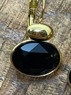 BOUCLES VIVINES ORNEES DE CRISTAUX SWAROVSKI  NOIRS