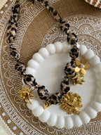 COLLIER LEOPARD  TISSU ET  ACIER INOXYDABLE