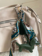 SAC:  PORTE CLES DE SAC          MOTIF CHIEN         12 COLORIS DIFFERENTS