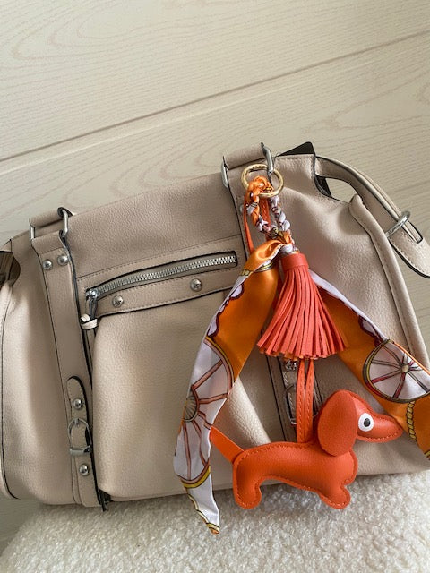 SAC:  PORTE CLES DE SAC          MOTIF CHIEN         12 COLORIS DIFFERENTS