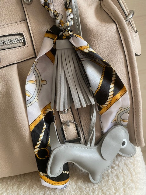 SAC:  PORTE CLES DE SAC          MOTIF CHIEN         12 COLORIS DIFFERENTS