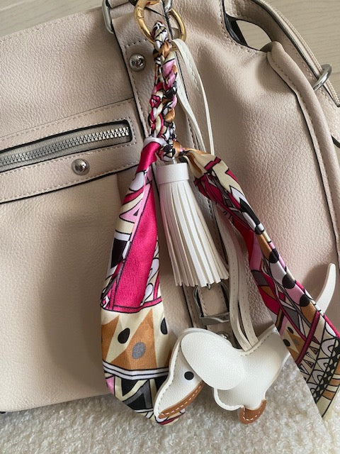 SAC:  PORTE CLES DE SAC          MOTIF CHIEN         12 COLORIS DIFFERENTS