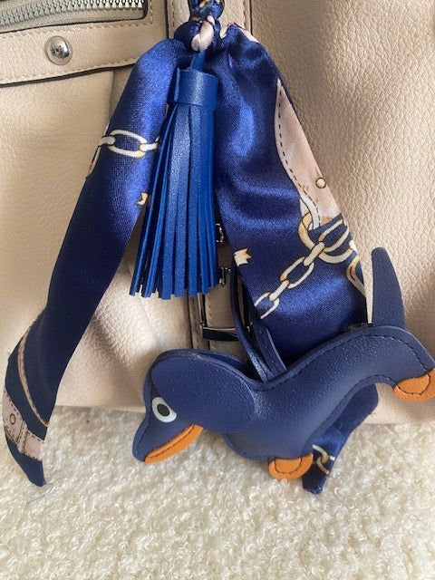 SAC:  PORTE CLES DE SAC          MOTIF CHIEN         12 COLORIS DIFFERENTS