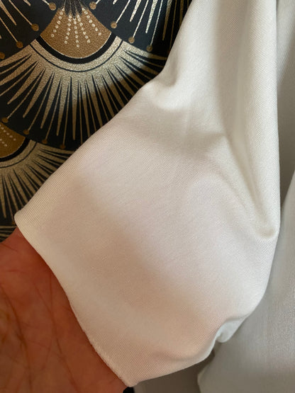 TOP STELLA 42/48  DEUX COLORIS ( BLANC CASSE ET ORANGE)